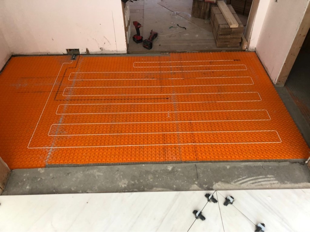 Indoor floor heating installation by HomeTech Secure